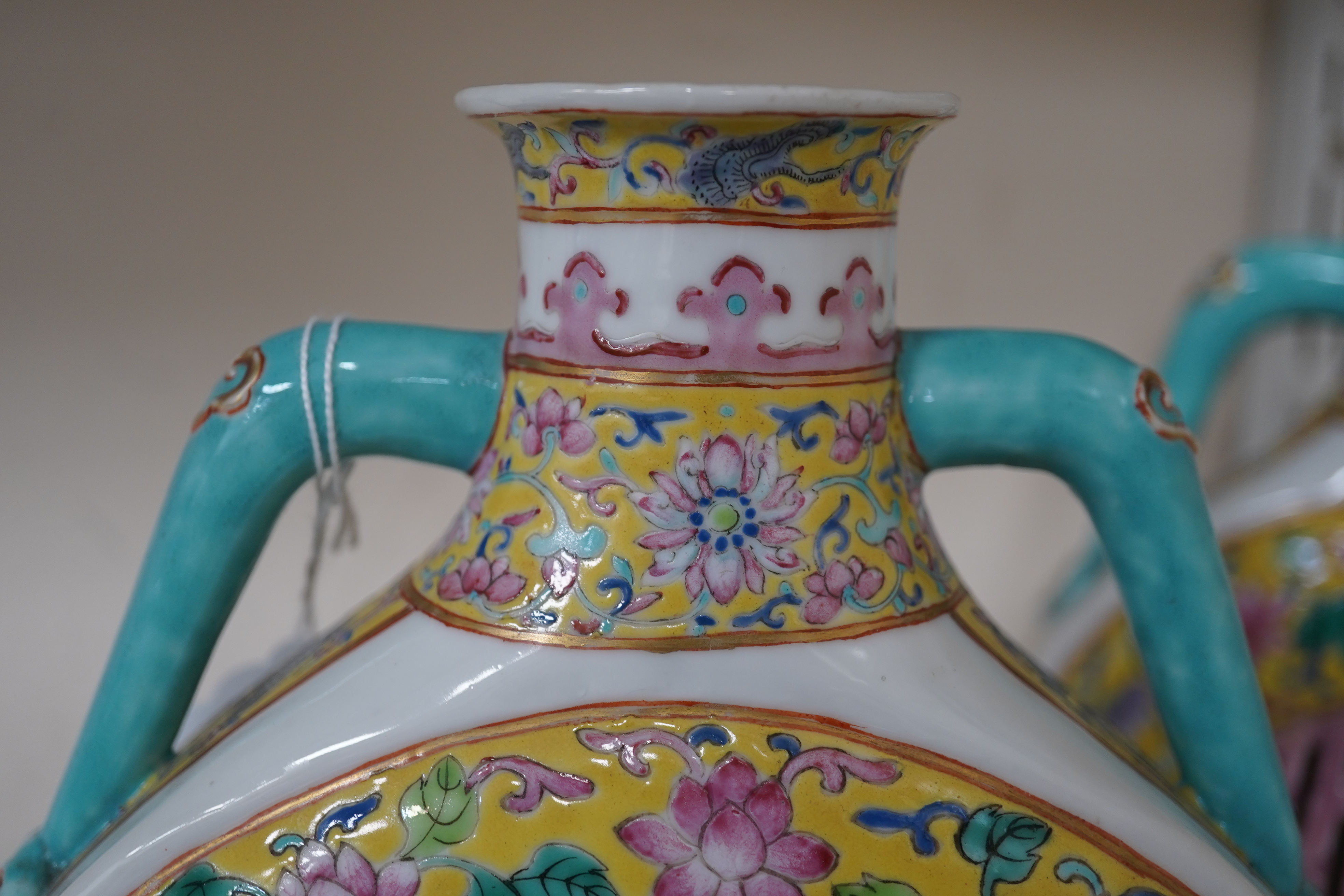 A pair of Chinese yellow ground double-walled moonflasks, bianhu, Daoguang marks, 19th century